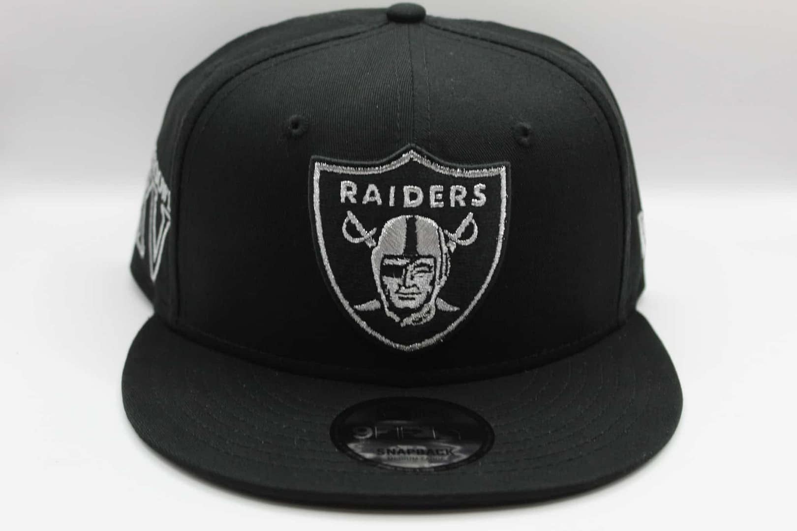 new era raiders negra