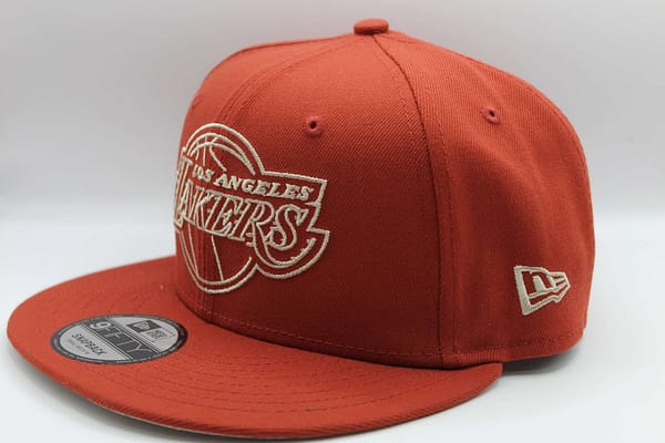 new era lakers naranja